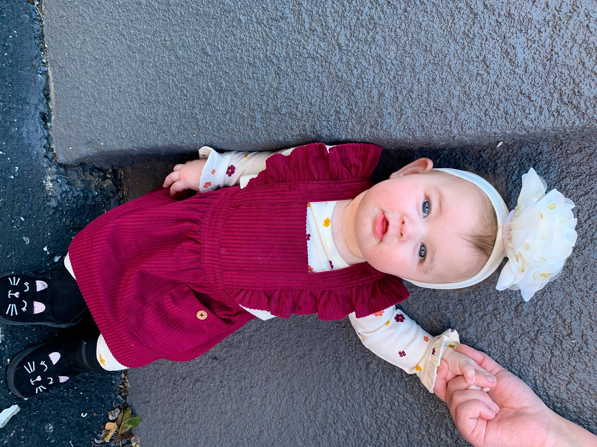 Anastasia is registered to the contest to win money with this photo: baby, baby_products, baby_toddler_clothing, carmine, child, costume_hat, fashion_accessory, hat, magenta, pattern, person, pink, sitting, sleeve, toddler, tree, wood