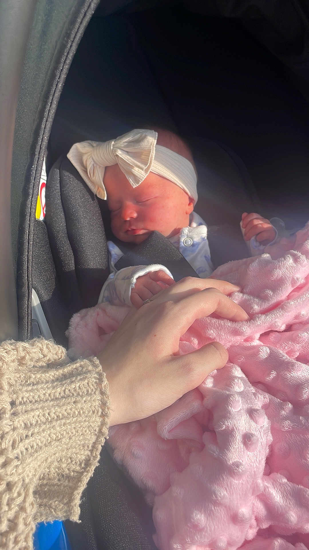 Myla-Mae joined the competition — help win amazing prizes! baby, sleeping, car_seat, headband, bow, blanket, pink, hand, knit_sweater, infant, peaceful, indoor, soft_texture, comfort, child, newborn, portrait, cute, warm, resting