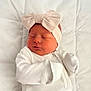 Myla-Mae joined the competition — help win amazing prizes! newborn, baby, sleeping, white_clothing, headband, bow, infant, soft, quilt, cute, peaceful, closeup, portrait, child, resting, indoors, tiny, wrapped, cozy, adorable