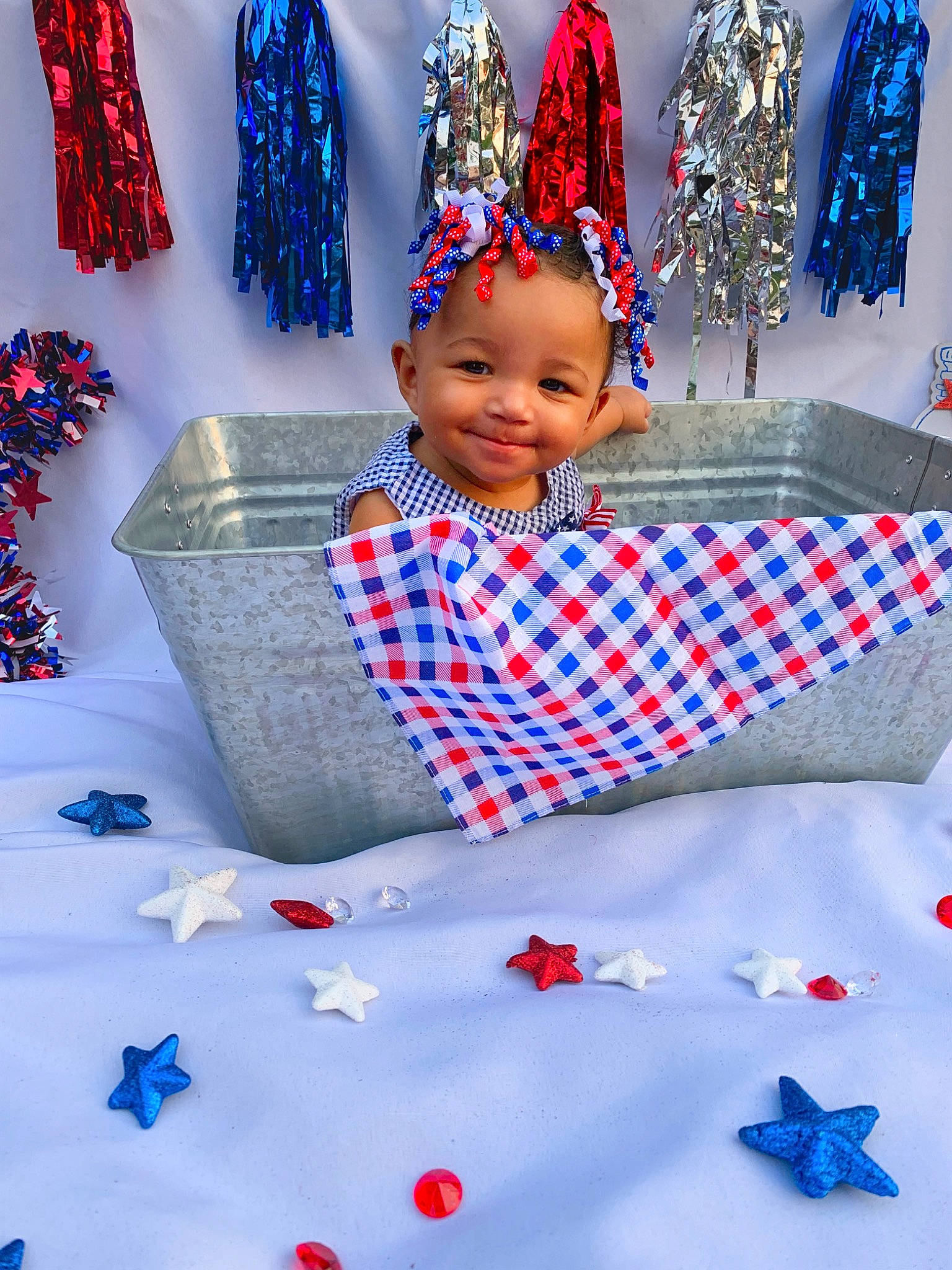 Raylyn is registered to the contest to win money with this photo: baby_toddler_clothing, blue, costume_hat, electric_blue, event, fun, happy, insect, joy, party_hat, party_supply, pattern, people, person, photograph, pink, product, red, smile, textile