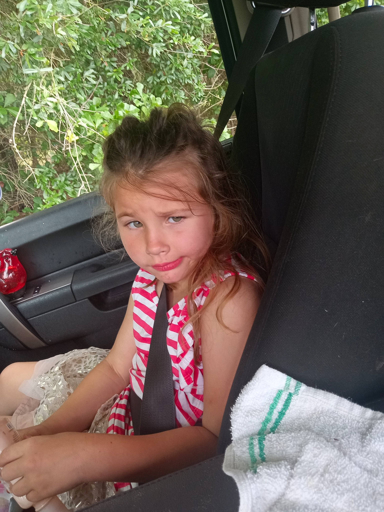 Arabella joined the competition — help win amazing prizes! auto_part, automotive_exterior, car_seat, dress, fun, grass, human_leg, leisure, long_hair, motor_vehicle, person, plant, recreation, steering_wheel, thigh, tints_and_shades, toddler, tree, vehicle_door, wheel