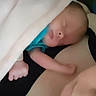 Naomi joined the competition — help win amazing prizes! baby, blanket, sleeping, child, person, face, skin, arm, indoor, rest, comfort, closeup, glasses, head, human, nap, soft, warm, cuddle, toddler