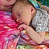 adult, baby, background, blanket, closeup, colorful, comfort, cuddle, face, glasses, hand, indoor, love, newborn, pattern, person, portrait, skin, sleeping, tie_dye
