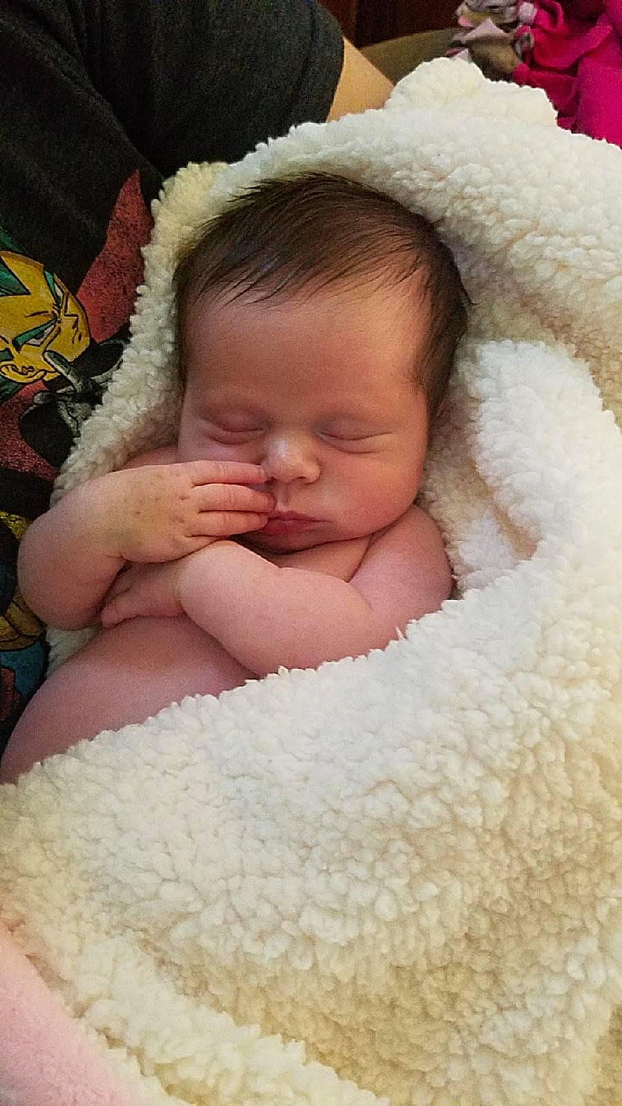 Liara is registered to the contest to win money with this photo: cheek, child, finger, girl, hand, infant, iris, nose, person, product, skin, sleep, textile, toddler