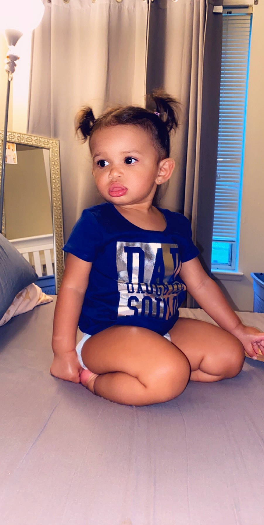 Amayah is registered to the contest to win money with this photo: arm, baby, baby_toddler_clothing, barefoot, cheek, child, finger, knee, leg, neck, person, shoulder, sitting, skin, thigh, toddler