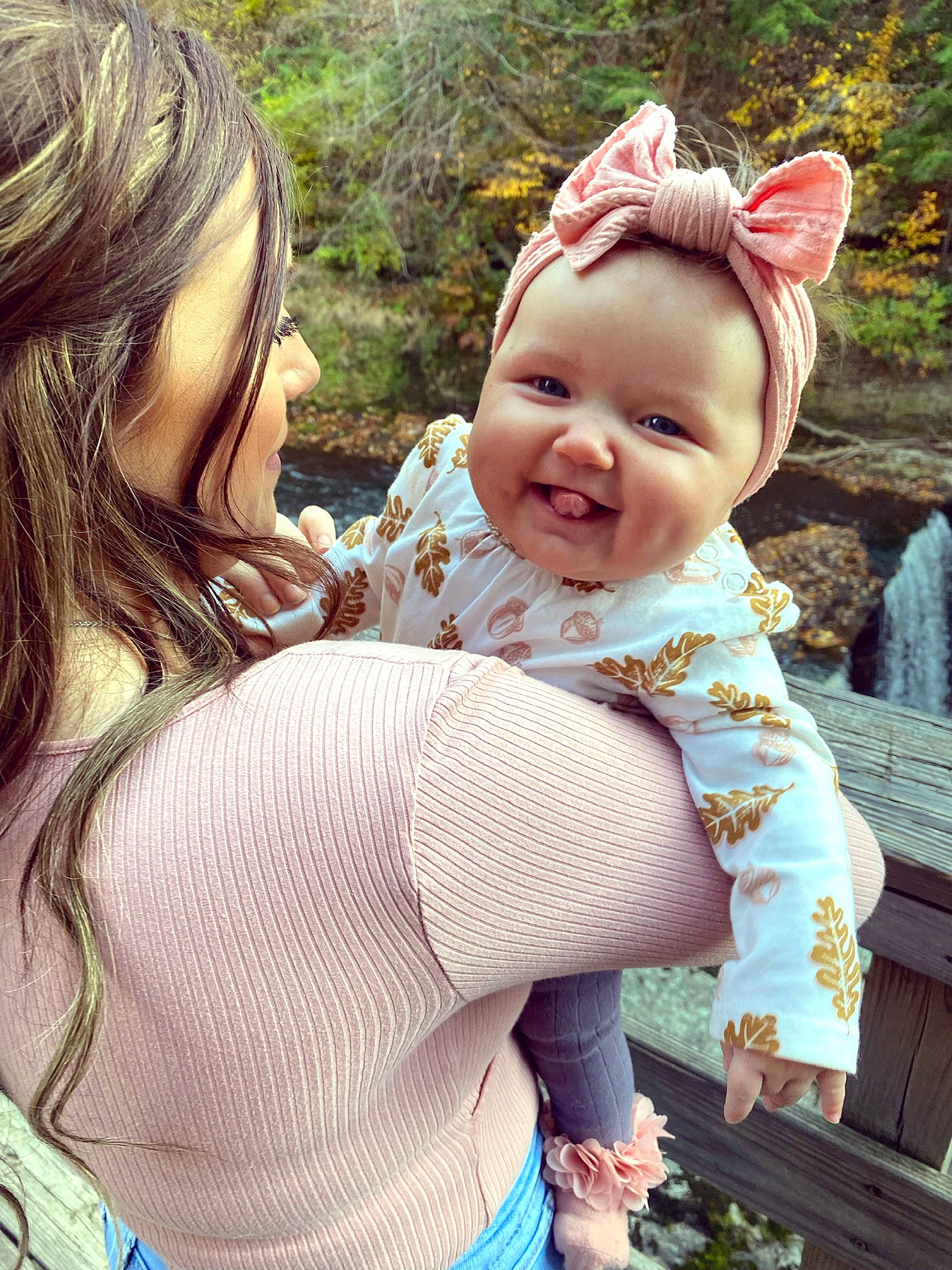 Brooklynn is registered to the contest to win money with this photo: adaptation, baby, baby_toddler_clothing, child, cool, eye, fun, gesture, grass, happy, interaction, joy, leisure, outerwear, people_in_nature, person, plant, sitting, skin, smile