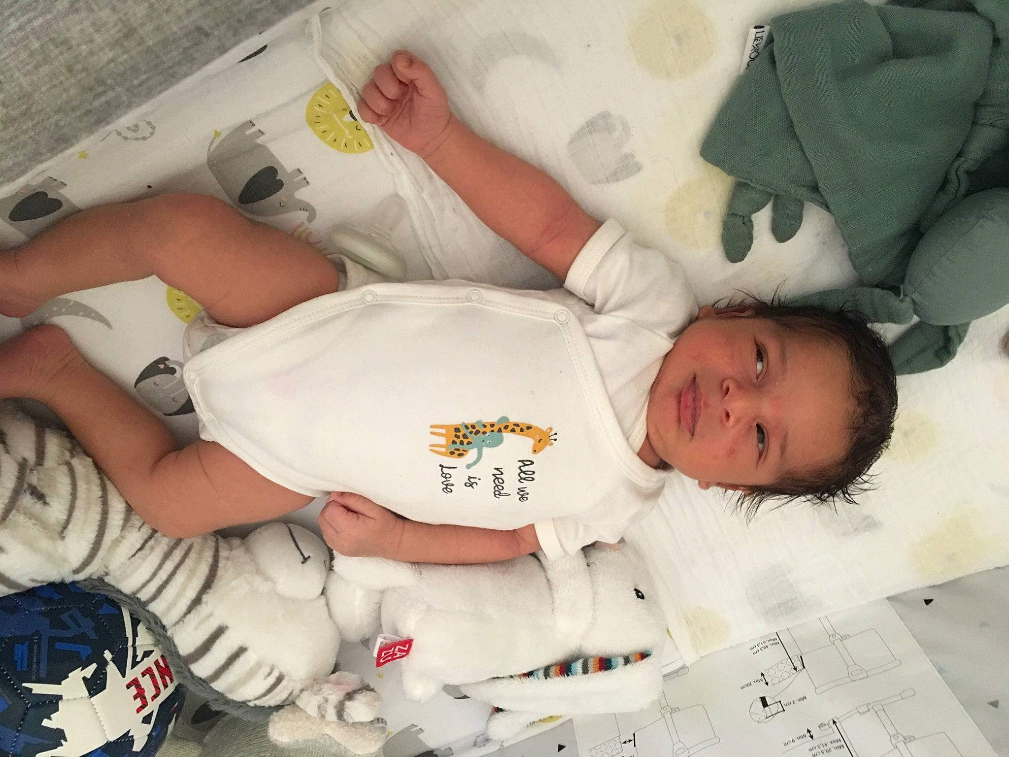 Milann participe au concours pour gagner de l'argent avec cette photo : baby, baby_products, baby_sleeping, baby_toddler_clothing, carmine, child, comfort, elbow, finger, font, linens, mammal, nail, pattern, person, product, sleeve, t_shirt, textile, toddler