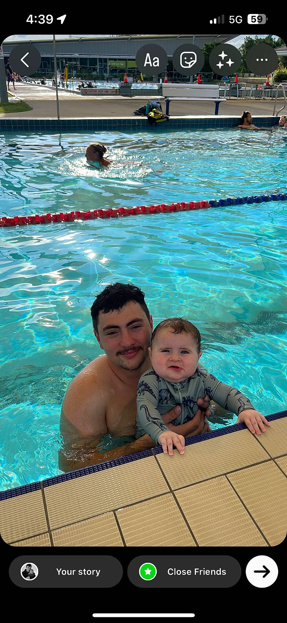 Braxton joined the competition — help win amazing prizes! azure, beauty, child, fun, indoor_games_and_sports, joy, leisure, morning, muscle, people, person, photograph, recreation, smile, snapshot, sports, summer, swimmer, swimming_pool, toddler