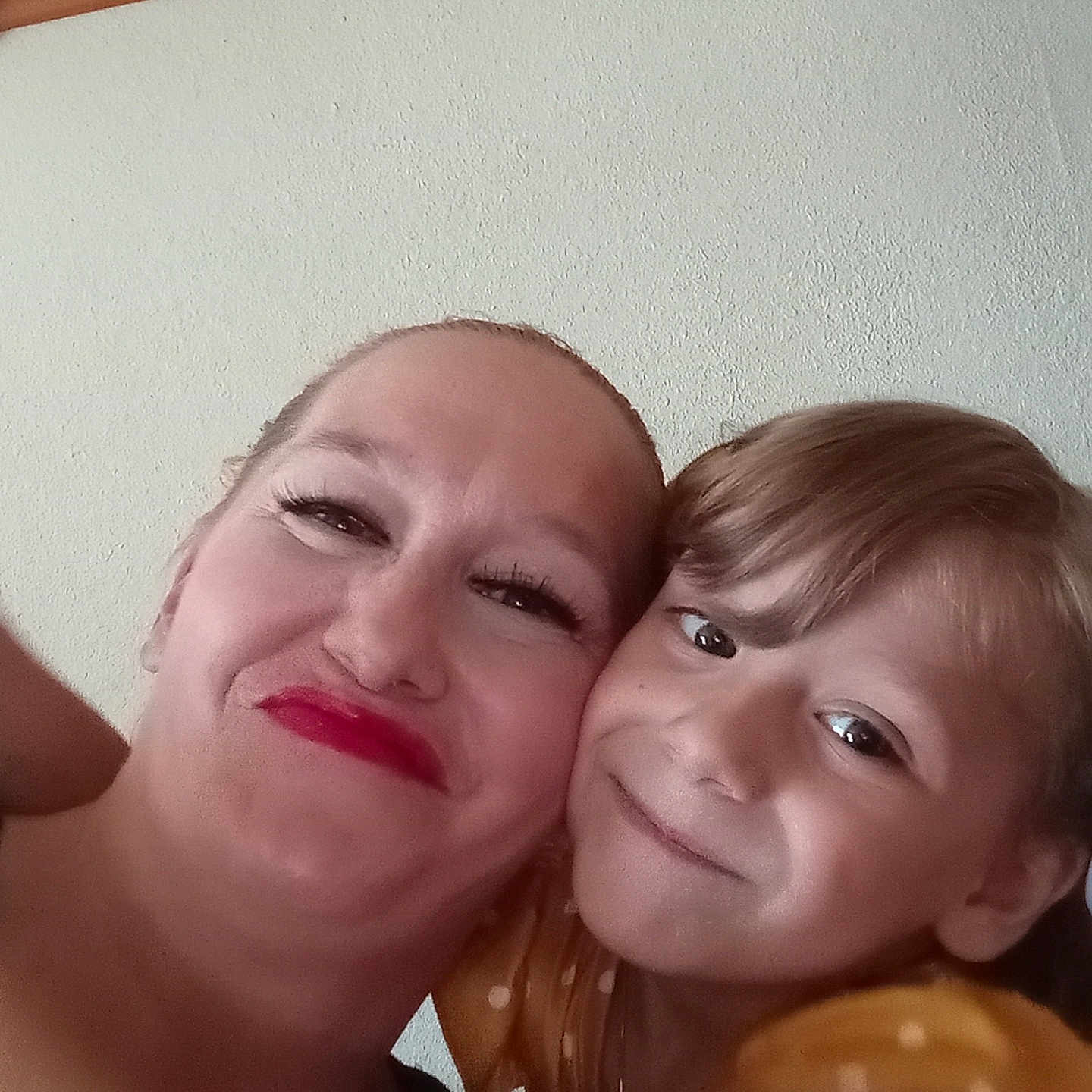 Rosalie is registered to the contest to win money with this photo: adult, baby, bodypart, cosmetics, face, female, finger, hand, happy, head, lipstick, mouth, neck, person, photography, portrait, selfie, smile, teeth, woman