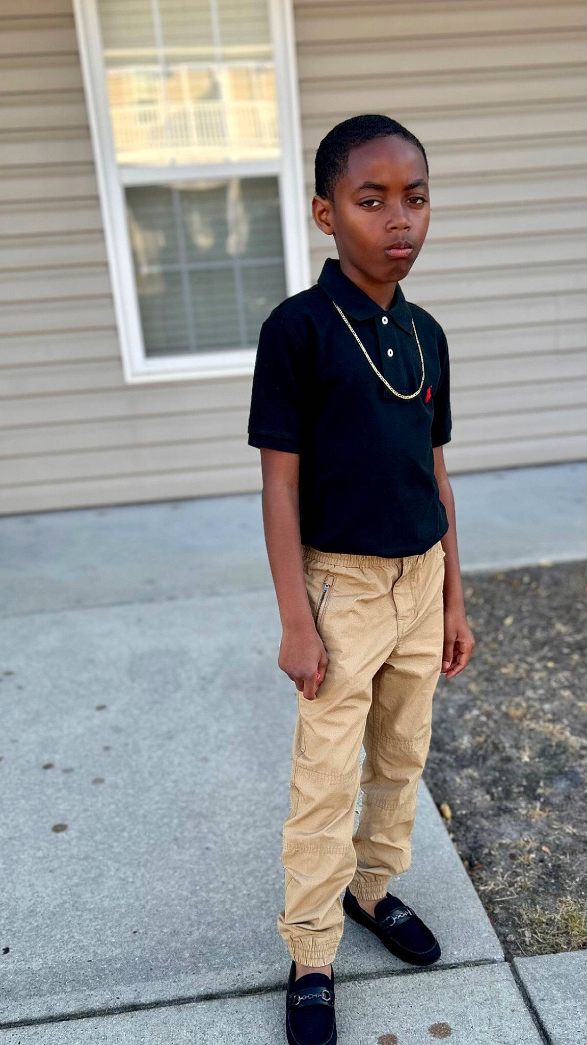 Joseph joined the competition — help win amazing prizes! asphalt, child, collar, denim, electric_blue, eyewear, fashion_design, formal_wear, grey, head, knee, person, pocket, sleeve, sportswear, t_shirt, top, uniform, waist, window