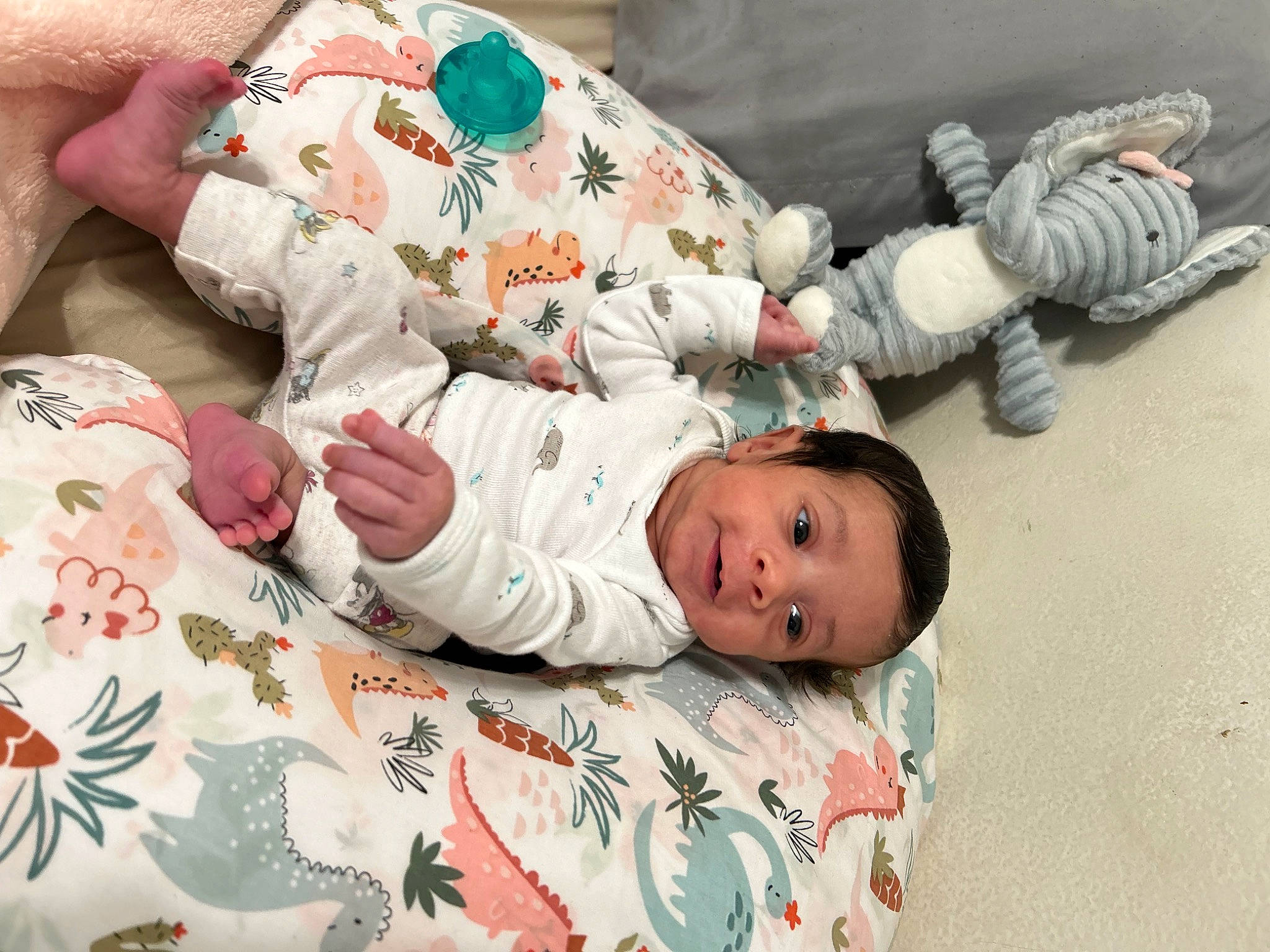 Amirah is registered to the contest to win money with this photo: baby, baby_products, baby_sleeping, baby_toddler_clothing, bedding, bedtime, child, comfort, hand, hat, linens, nap, pattern, person, room, sitting, skin, sleep, sleeve, smile