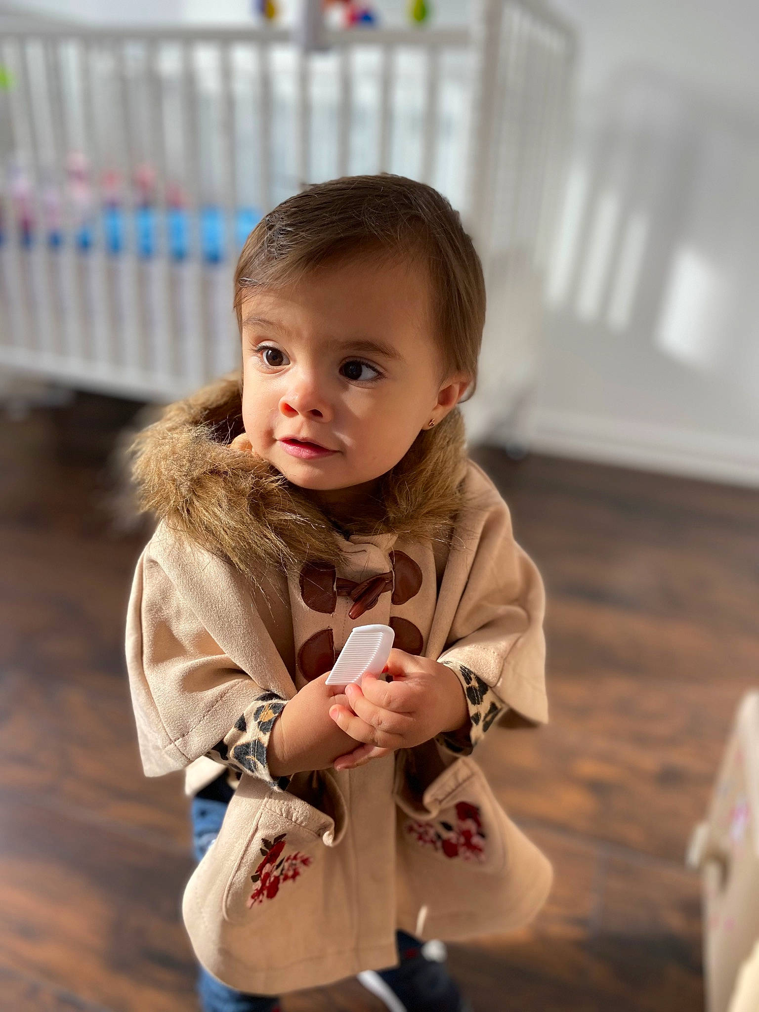 Allison is registered to the contest to win money with this photo: baby, baby_toddler_clothing, cheek, child, eye, face, fence, flooring, fun, fur, happy, leisure, person, play, recreation, room, sitting, skin, sleeve, toddler