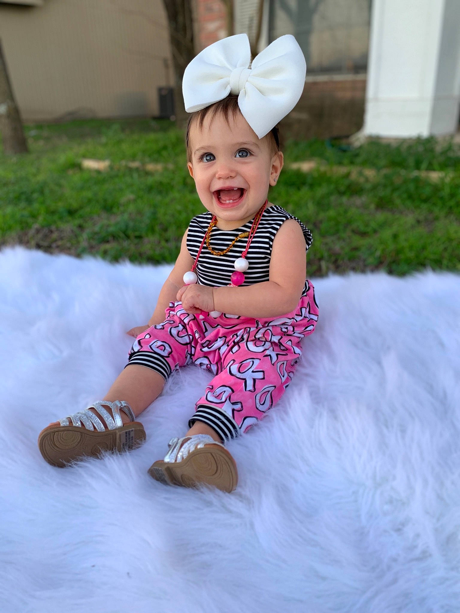 Kinlee is registered to the contest to win money with this photo: baby, baby_toddler_clothing, beauty, child, dress, event, face, fun, happy, headgear, joy, magenta, pattern, person, pink, purple, sleeve, smile, snapshot, sock