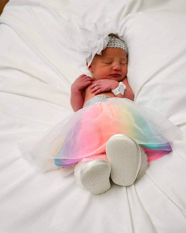 Chloe Leeann Scott is registered to the contest to win money with this photo: baby, baby_products, baby_sleeping, baby_toddler_clothing, bedding, bedtime, child, comfort, event, fashion_accessory, happy, headwear, jewellery, linens, magenta, person, petal, pink, sitting, textile