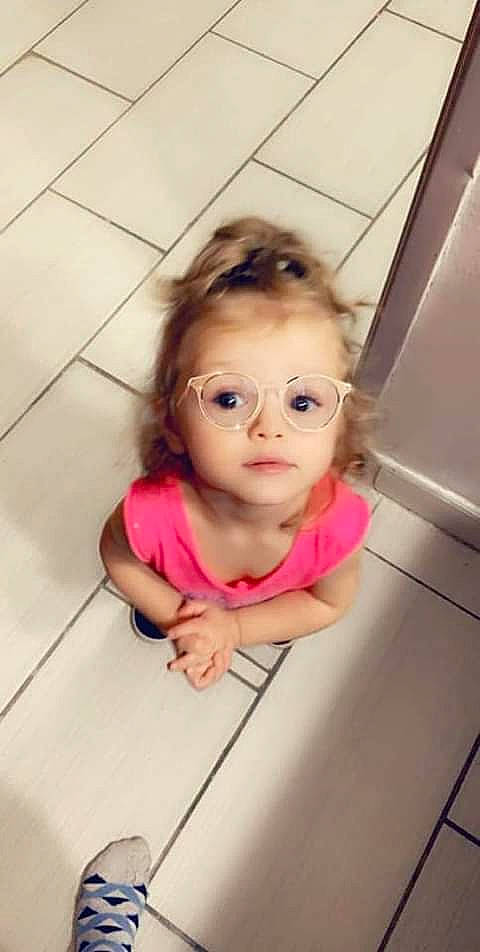 Brooklynn joined the competition — help win amazing prizes! baby, baby_toddler_clothing, cheek, child, child_model, curious, finger, floor, flooring, person, pink, shoulder, skin, tile, toddler, vision_care