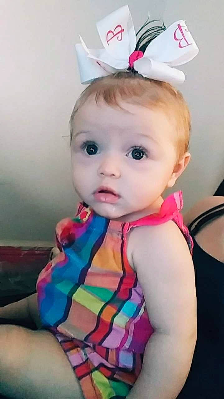 Brooklynn joined the competition — help win amazing prizes! baby, baby_toddler_clothing, cheek, child, ear, hair_accessory, headgear, person, product, surprise, toddler