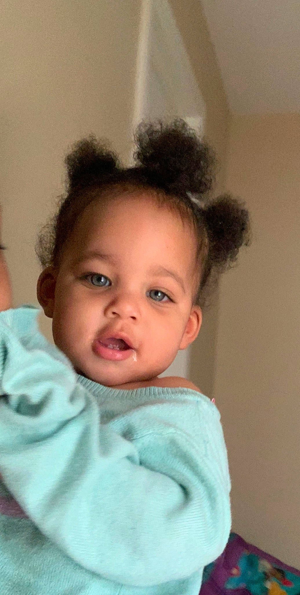 Jupiter is registered to the contest to win money with this photo: baby, black_hair, cheek, child, chin, ear, eye, eyebrow, face, facial_expression, forehead, hair, hairstyle, head, iris, lip, nose, person, skin, smile