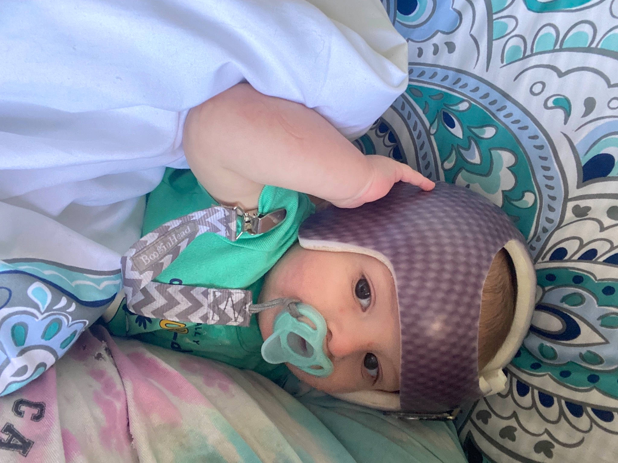 Braylyn joined the competition — help win amazing prizes! abdomen, aqua, arm, baby, blue, child, comfort, dress, eye, eyelash, hand, headwear, health_care, human_body, joint, medical, medical_equipment, pattern, person, purple