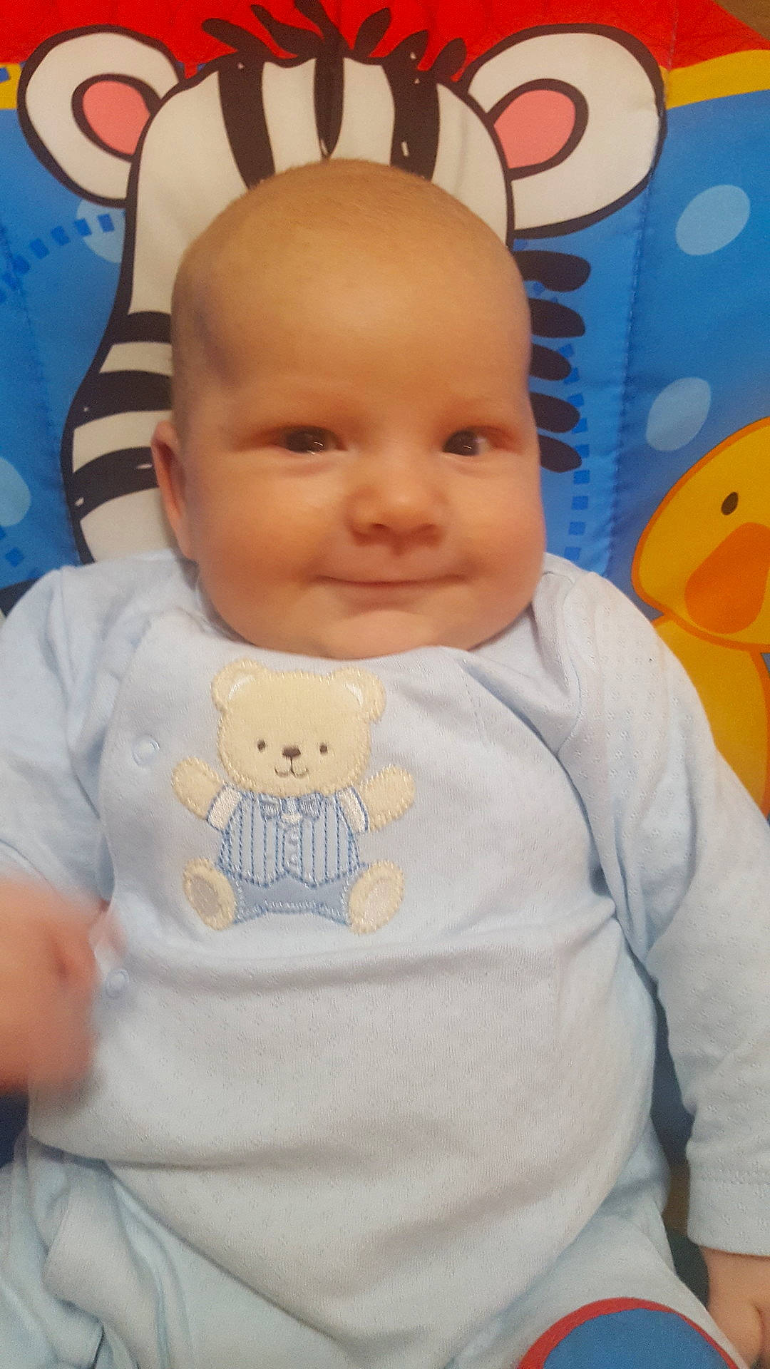 Jonathon is registered to the contest to win money with this photo: baby_products, boy, cheek, child, day, eye, face, facial_expression, fun, head, infant, joy, nose, person, product, skin, smile, textile, toddler