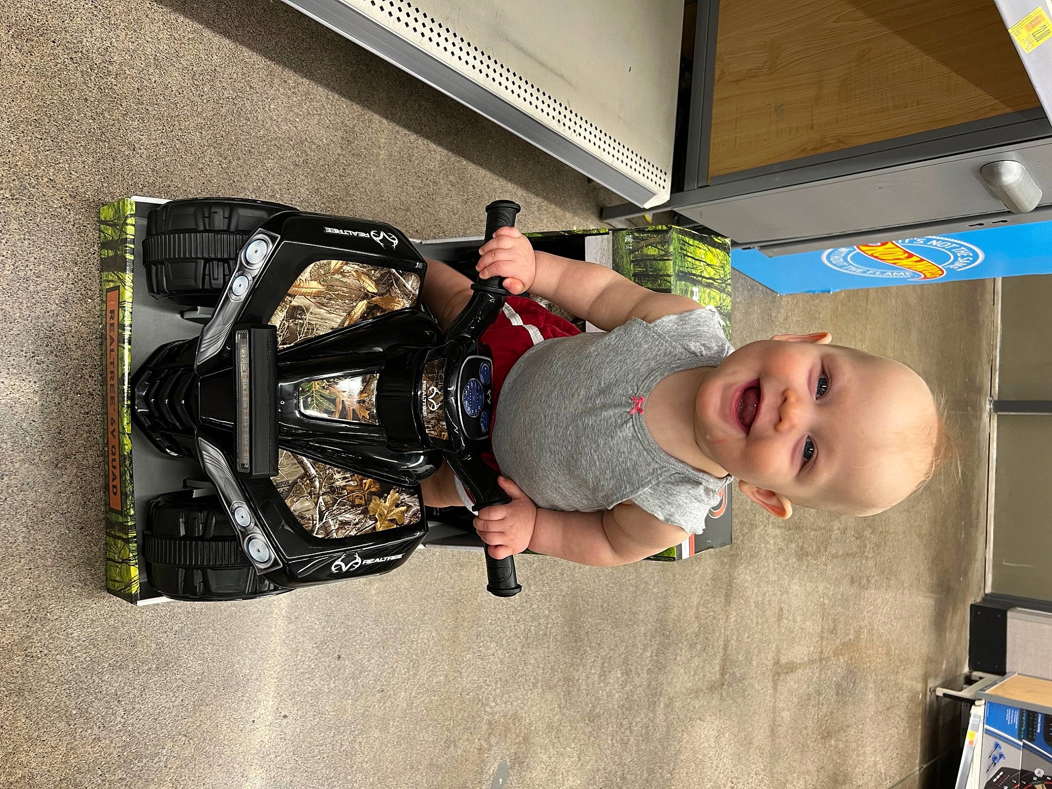 Emerlynn joined the competition — help win amazing prizes! audio_equipment, automotive_design, automotive_exterior, automotive_lighting, automotive_tire, baby, baby_toddler_clothing, bumper, child, flooring, fun, joy, motor_vehicle, person, rim, room, smile, t_shirt, tire, toddler