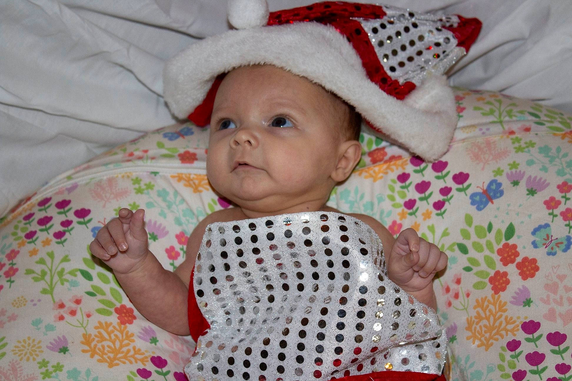 Adelynn is registered to the contest to win money with this photo: baby, baby_products, baby_toddler_clothing, child, headgear, linens, person, product, textile, toddler