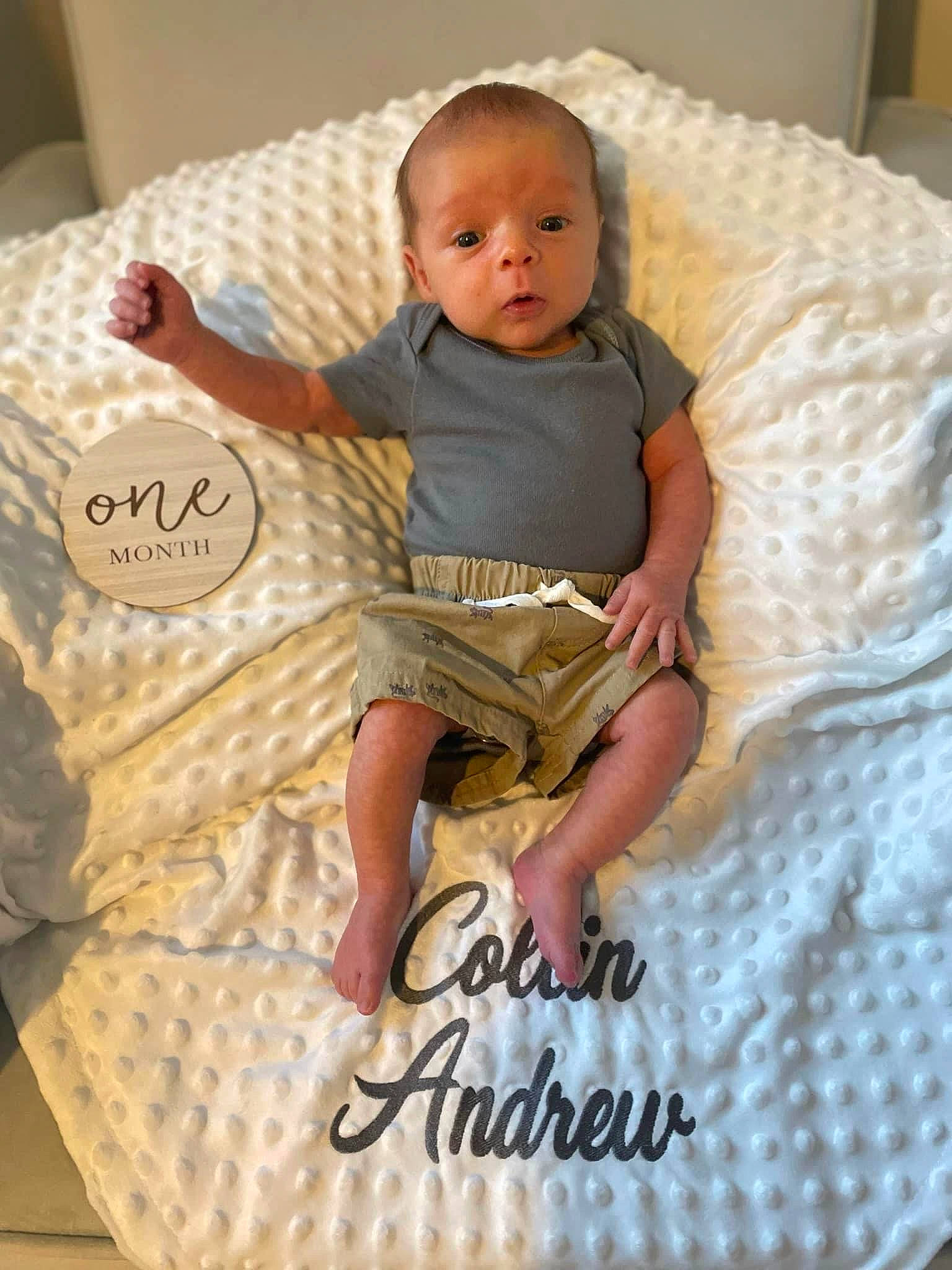 Collin joined the competition — help win amazing prizes! baby, baby_products, baby_toddler_clothing, bedding, chair, child, comfort, couch, font, happy, linens, pattern, person, pillow, pink, sitting, sock, t_shirt, textile, throw_pillow