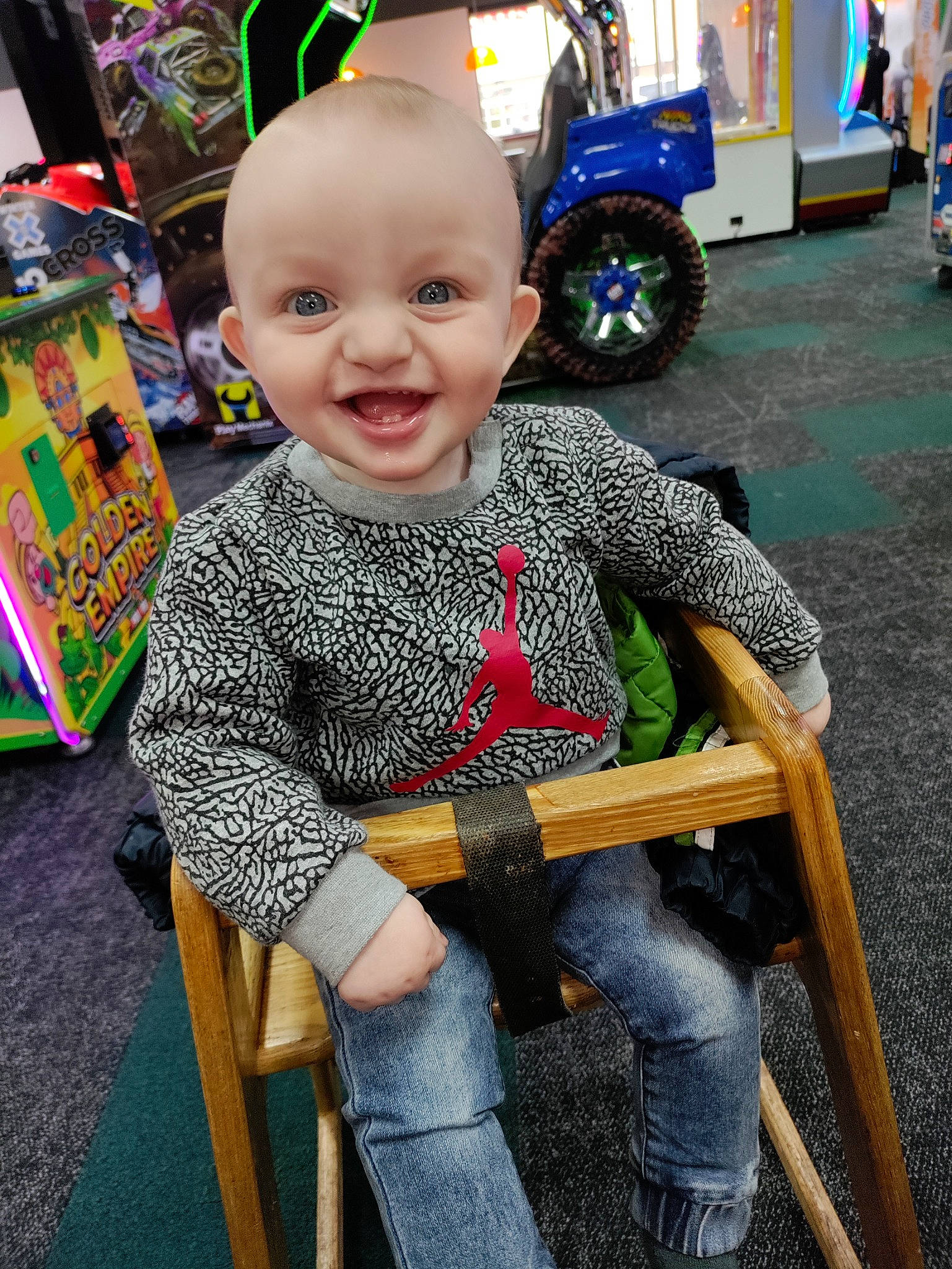 Destin joined the competition — help win amazing prizes! baby, chair, child, city, fun, happy, jeans, joy, leisure, motor_vehicle, person, photograph, public_space, sitting, smile, snapshot, standing, tire, toddler, vehicle