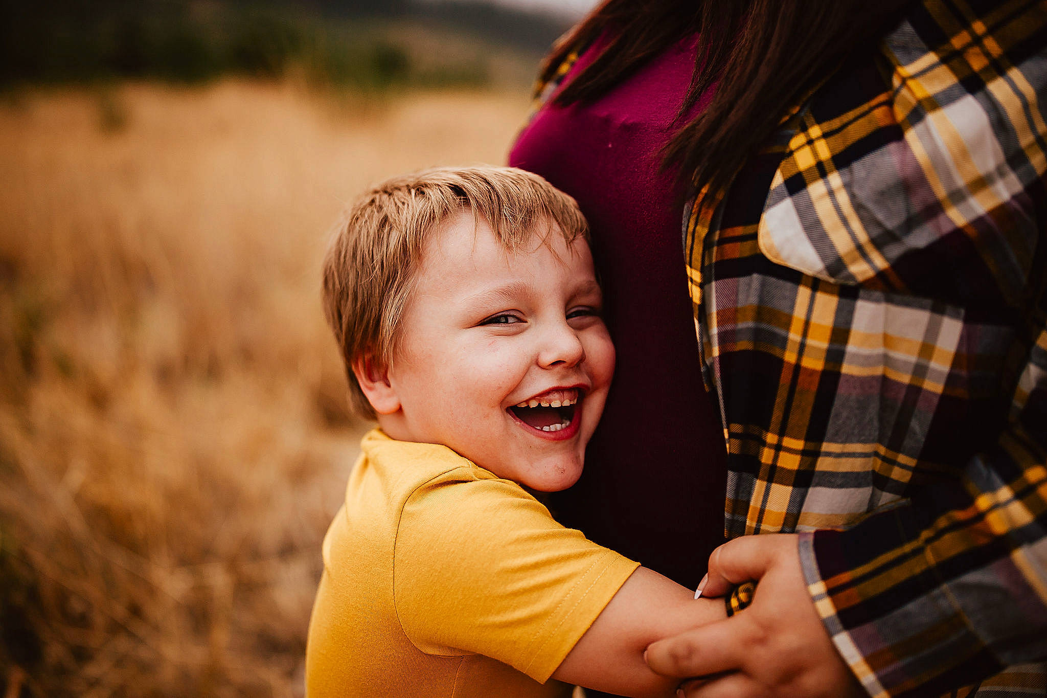 Jayden joined the competition — help win amazing prizes! child, flash_photography, fun, gesture, grass, hand, happy, joy, landscape, leisure, people_in_nature, person, plaid, plant, recreation, shirt, smile, sunlight, t_shirt, tartan