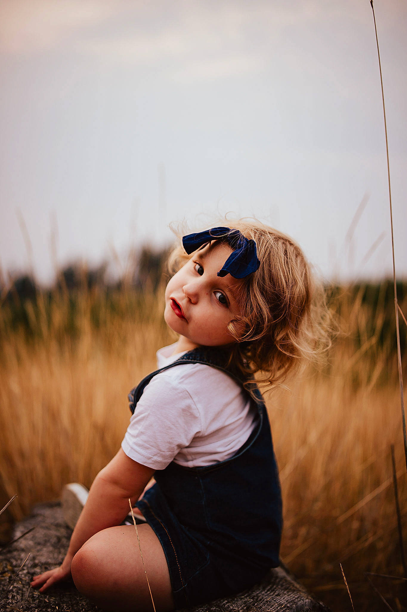 Holley joined the competition — help win amazing prizes! blond, brown_hair, eyewear, face, field, flash_photography, grass, grassland, happy, human_leg, landscape, lip, long_hair, person, prairie, skin, sky, summer, sunlight, tints_and_shades