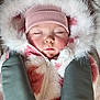 baby, beanie, car_seat, child, closed_eyes, cozy, cute, face, fur_hood, hat, infant, jacket, pink, polka_dot, portrait, sleeping, soft_texture, straps, warm_clothing, white