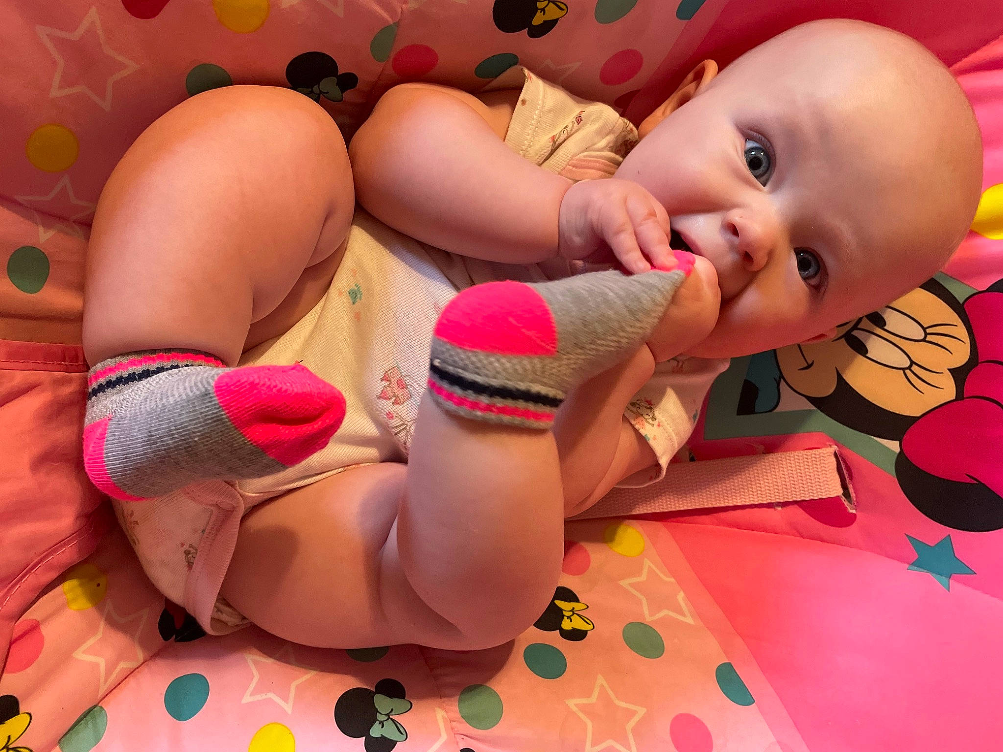 Onyx is registered to the contest to win money with this photo: baby, baby_toddler_clothing, chest, comfort, finger, happy, human_body, knee, leg, mammal, mouth, orange, person, pink, skin, swimwear, thigh, thumb, toddler, trunk