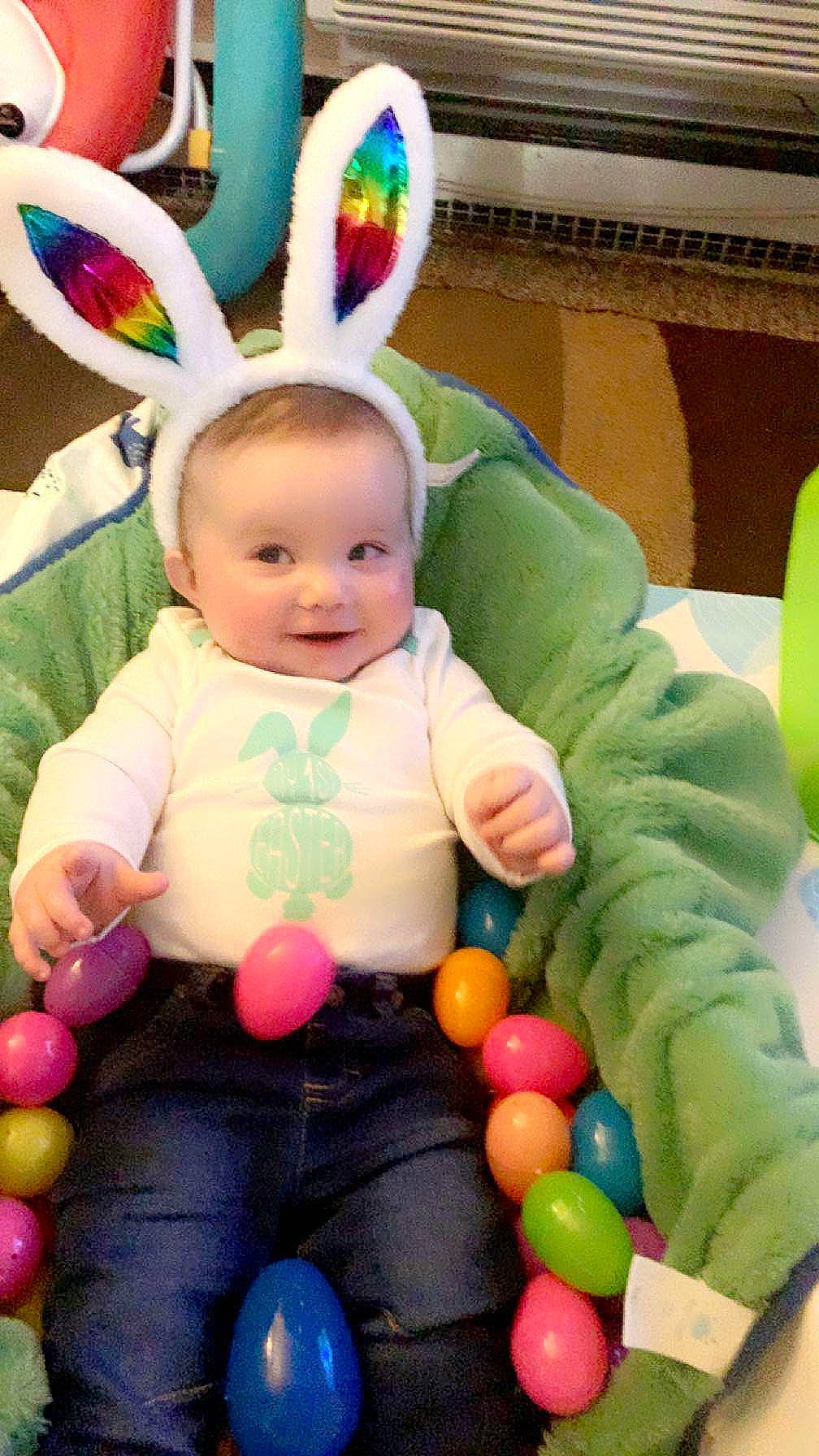 Ashton joined the competition — help win amazing prizes! baby, baby_toddler_clothing, cheek, ear, facial_expression, fun, green, happy, head, human_body, organ, person, photograph, pink, product, skin, smile, textile, toddler, white