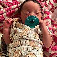 Aniyah joined the competition — help win amazing prizes! baby, blanket, child, clothing, comfort, cozy, cute, elephant_pattern, indoors, infant, newborn, pacifier, pajamas, peaceful, pink, resting, sleeping, soft, tiny, white