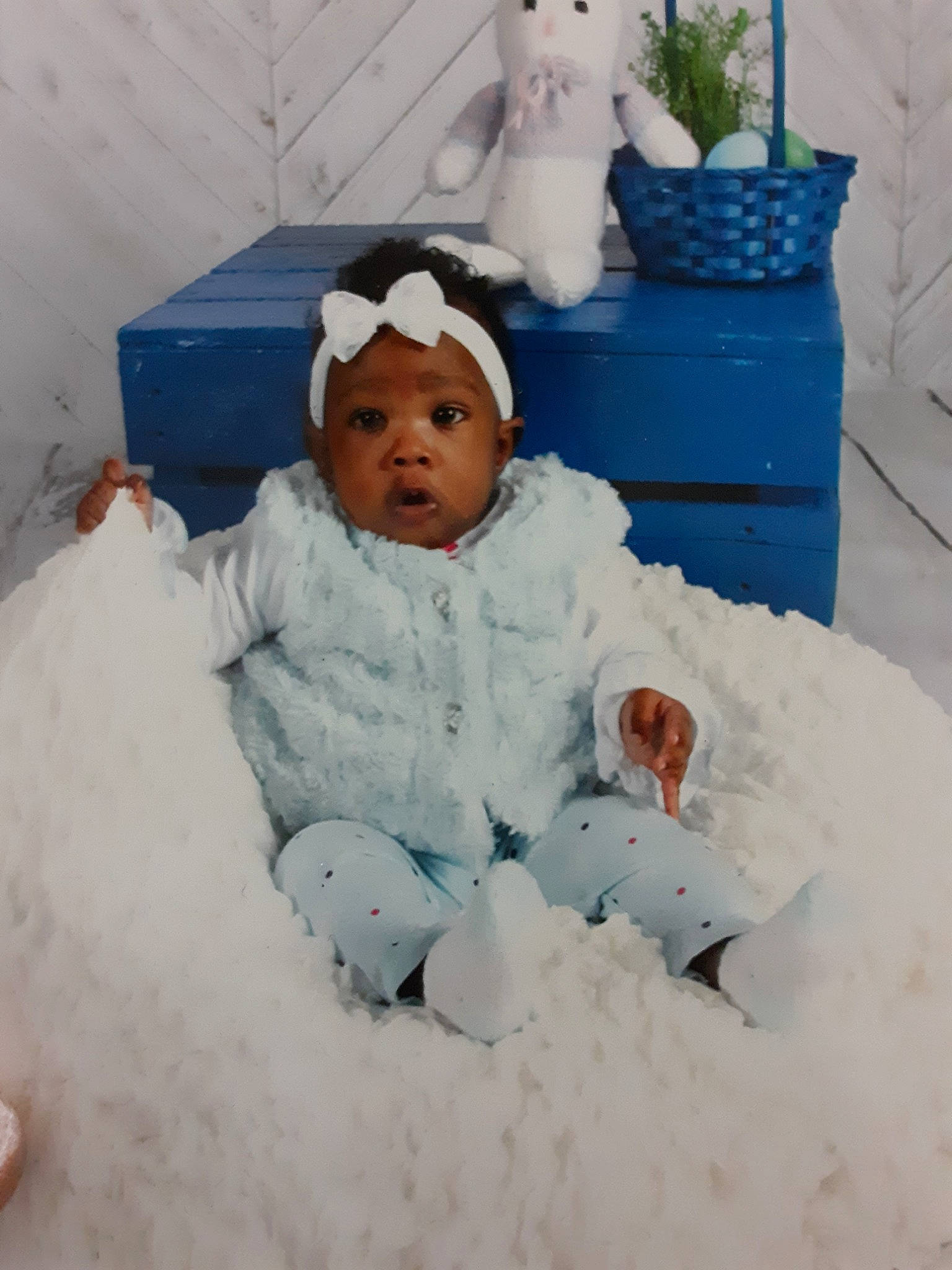 Caleesi is registered to the contest to win money with this photo: baby, child, headwear, person, playing_in_the_snow, snow, toddler, winter