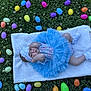 baby, ball, balloon, blanket, clothing, egg, face, flower, food, footwear, grass, head, people, person, petal, photography, plant, portrait, quilt, shoe