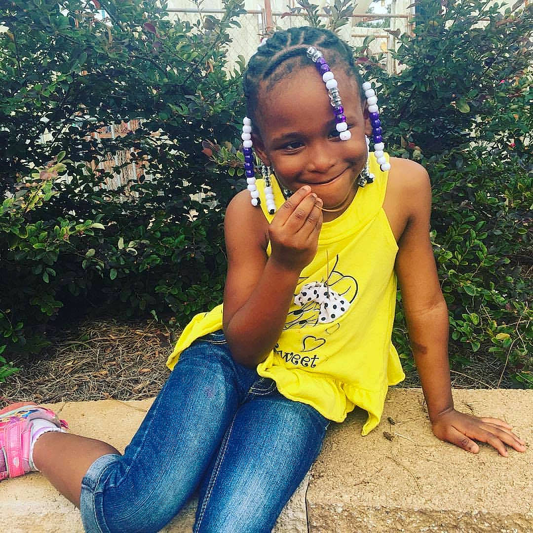 Yuliana is registered to the contest to win money with this photo: adaptation, beauty, black_hair, child, child_model, cool, denim, happy, human, jeans, joy, person, photo_shoot, plant, sitting, smile, summer, thigh, yellow