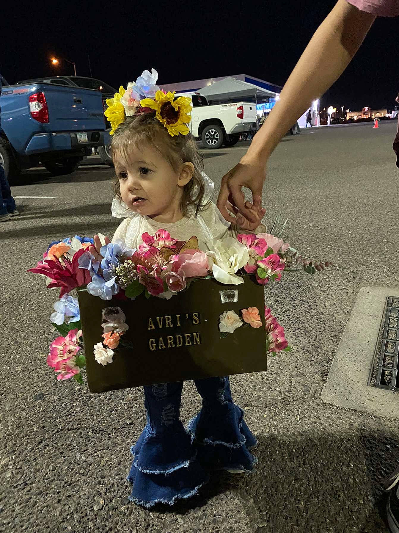 Avri joined the competition — help win amazing prizes! automotive_design, automotive_wheel_system, bouquet, car, event, flower, flower_arranging, fun, motor_vehicle, person, petal, plant, public_space, standing, summer, tire, toddler, vehicle, vehicle_door, wheel