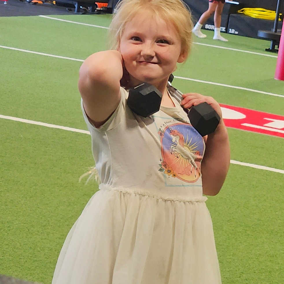 Amelia joined the competition — help win amazing prizes! advertisement, blonde, bodypart, child, clothing, dress, face, female, finger, girl, grass, hair, hand, head, people, person, photography, plant, portrait, t_shirt