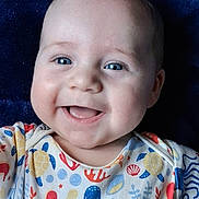 Brody Wayne joined the competition — help win amazing prizes! baby, blanket, blue_eyes, child, closeup, cute, face, happy, infant, joyful, lying_down, octopus, onesie, patterned_clothing, portrait, sea_creatures, seahorse, shell, smiling, turtle