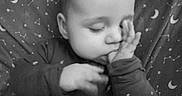 Brody Wayne joined the competition — help win amazing prizes! baby, bedtime, blanket, child, closeup, constellation, cute, face, hand, infant, monochrome, moon, pajamas, peaceful, portrait, resting, sleeping, soft, stars, thumb_sucking