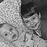 Brody Wayne is registered to the contest to win money with this photo: baby, black_and_white, child, close_up, couch, cute, face, family, happy, indoor, infant, leopard_print, love, pillow, portrait, sibling, smiling, toddler, together, young
