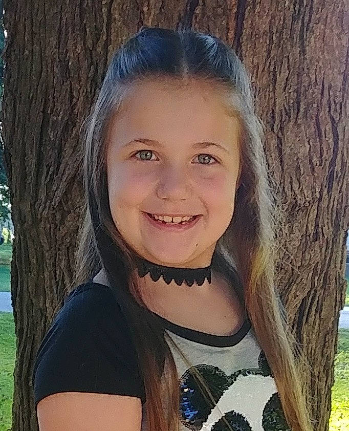 Aubree is registered to the contest to win money with this photo: beauty, brown_hair, child, child_model, chin, face, fawn, hair, hairstyle, happy, head, joy, lip, long_hair, nose, person, photography, plant, selfie, smile