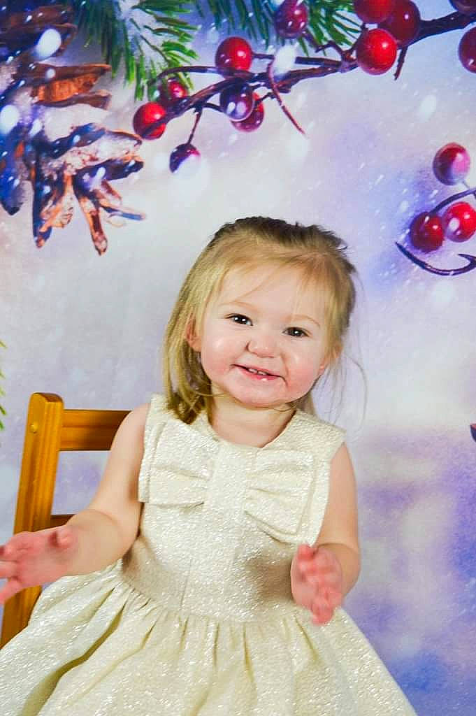 Carlee is registered to the contest to win money with this photo: baby, child, child_model, christmas, christmas_decoration, christmas_eve, christmas_tree, happy, joy, party_supply, person, plant, play, smile, toddler, tree