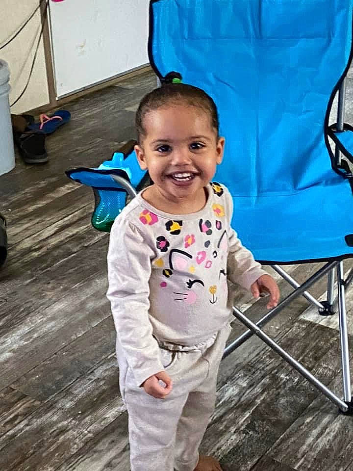 Kenzleigh is registered to the contest to win money with this photo: baby, baby_products, baby_toddler_clothing, blue, child, electric_blue, event, fashion_accessory, flooring, fun, hairstyle, happy, joy, leisure, person, play, recreation, sitting, smile, toddler