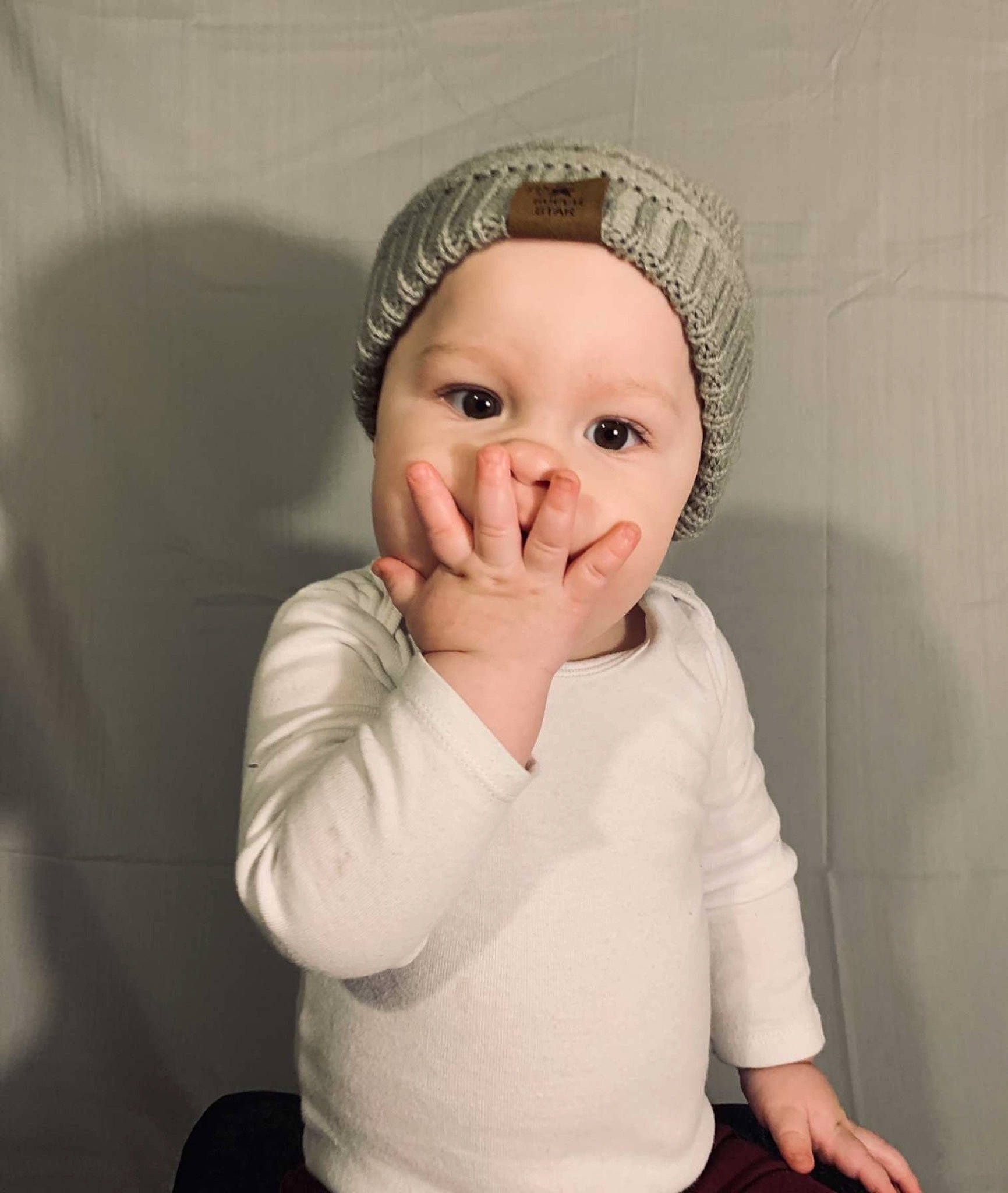 Kaizer joined the competition — help win amazing prizes! arm, baby, baby_toddler_clothing, blond, cap, cheek, comfort, eye, eyelash, flash_photography, gesture, happy, jaw, knit_cap, lip, neck, nose, person, sleeve, t_shirt