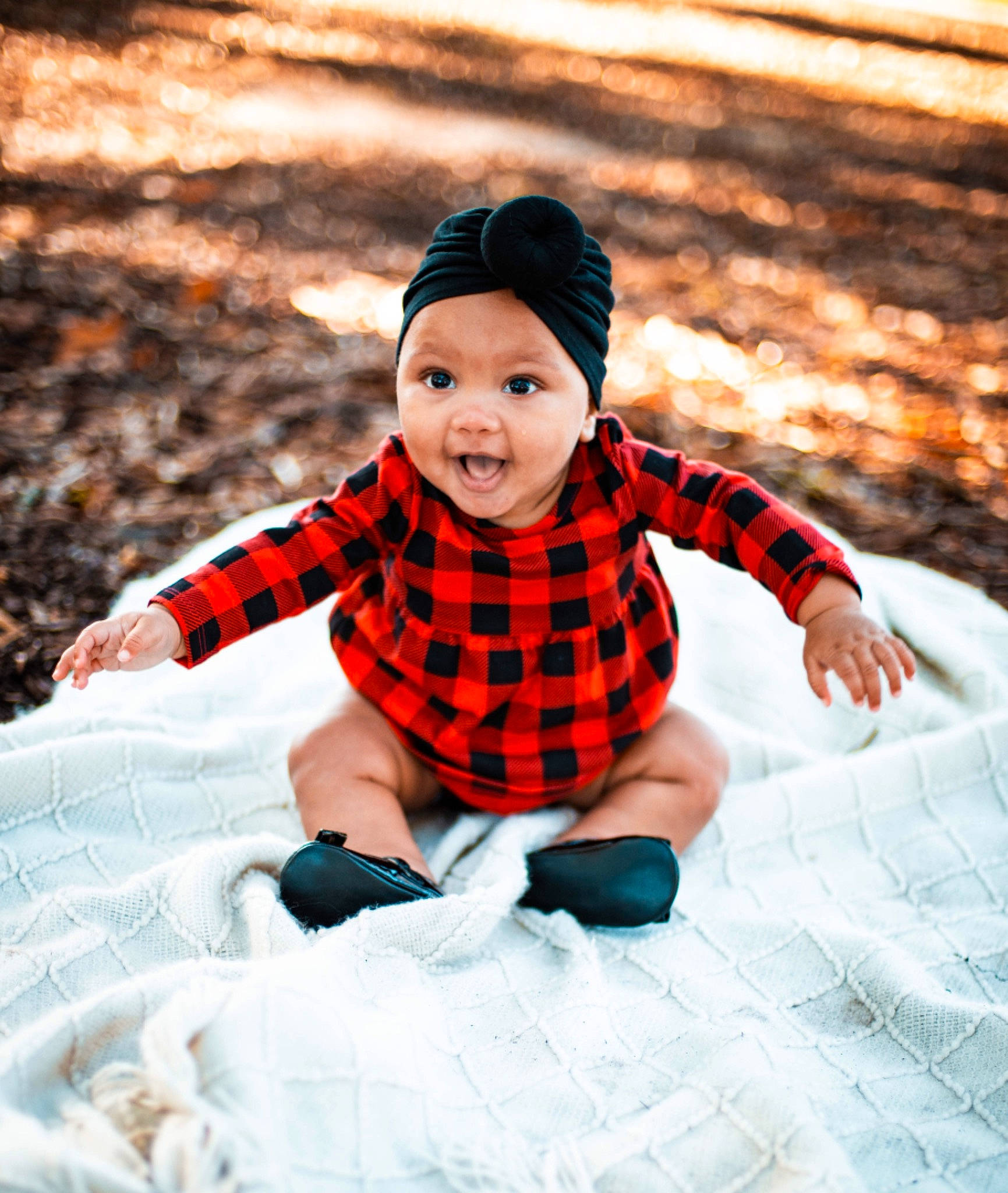 Dalilah joined the competition — help win amazing prizes! baby, baby_toddler_clothing, child, child_model, design, headwear, pattern, person, photography, plaid, portrait_photography, smile, surprise, toddler