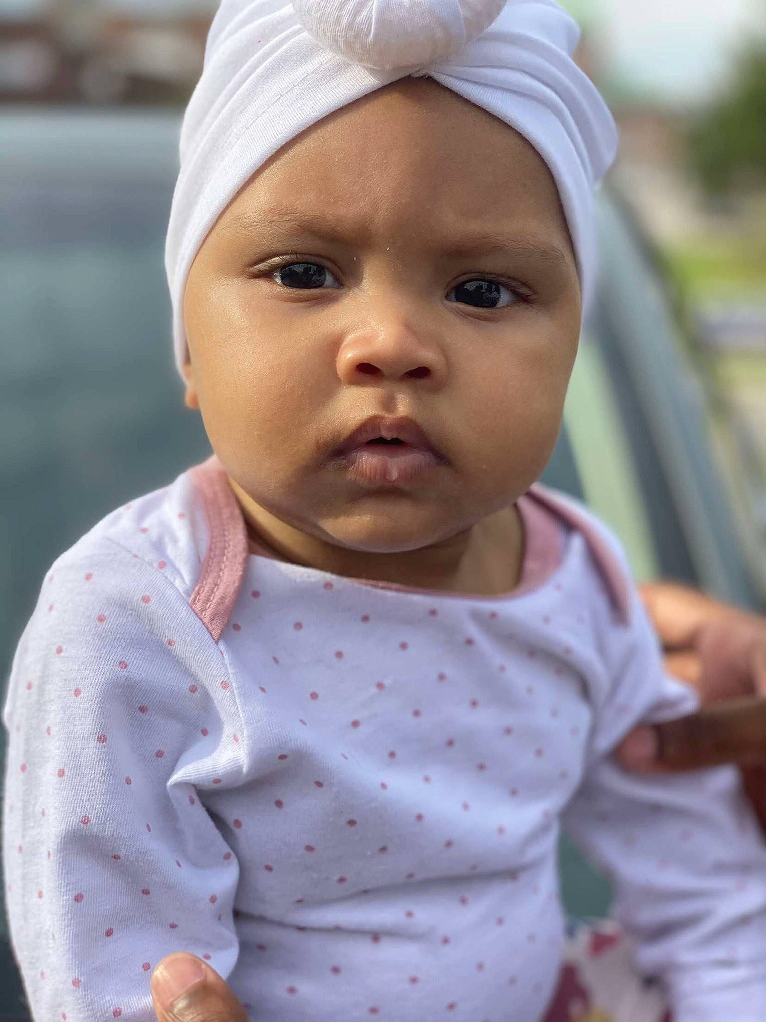 Dalilah joined the competition — help win amazing prizes! baby, cheek, child, eye, face, head, headgear, headwear, lip, person, pink, skin, smile, toddler