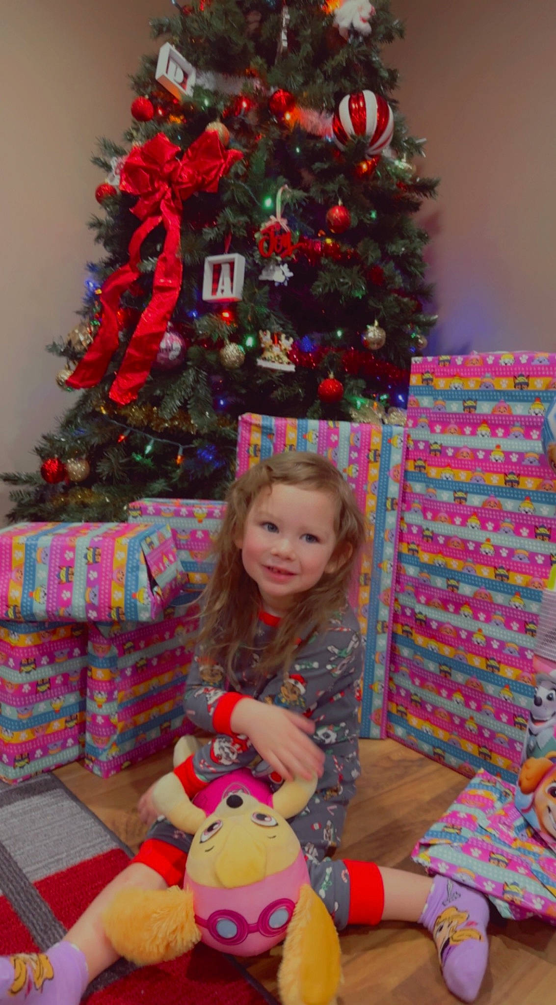 Adelaide joined the competition — help win amazing prizes! christmas, christmas_decoration, christmas_eve, christmas_ornament, christmas_tree, conifer, event, evergreen, fun, happy, holiday, holiday_ornament, joy, lap, ornament, pattern, person, room, sitting, smile