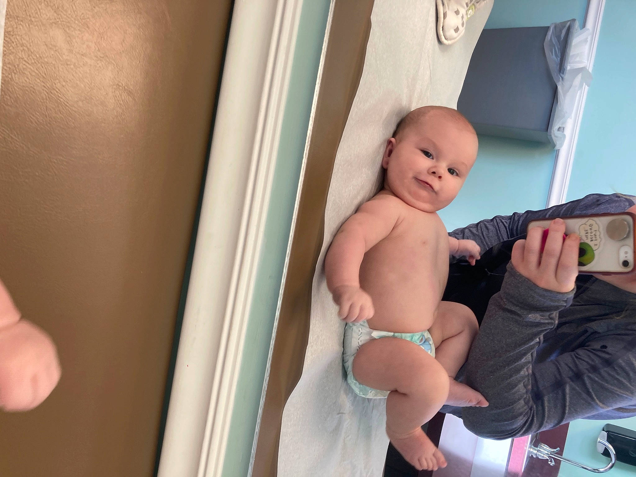 Kaius is registered to the contest to win money with this photo: abdomen, baby, chest, elbow, event, finger, happy, human_leg, joint, knee, navel, person, shorts, shoulder, skin, smile, stomach, thigh, thumb, toddler