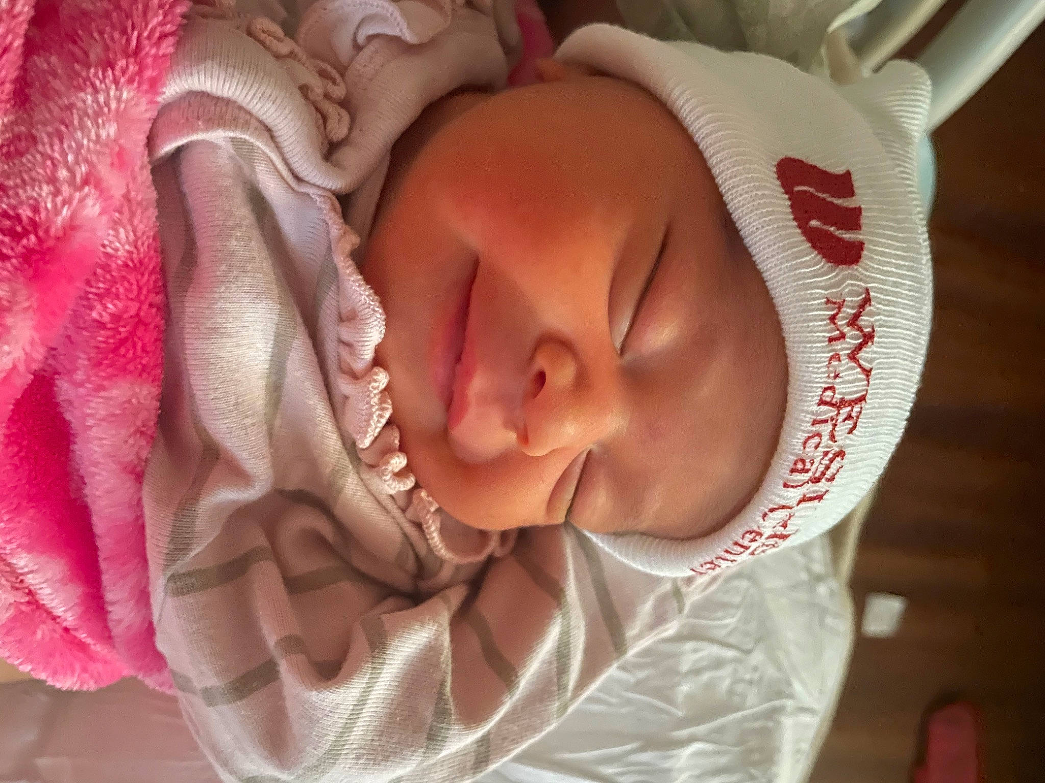 Adyline is registered to the contest to win money with this photo: arm, baby, cheek, chin, comfort, ear, eye, eyebrow, eyelash, face, hand, headwear, human_body, lip, mouth, neck, nose, person, product, skin